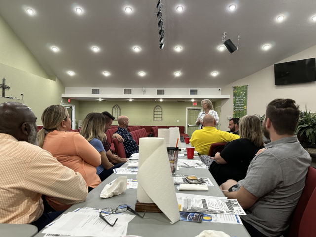 Charlotte Edwards speaking at a leadership training session